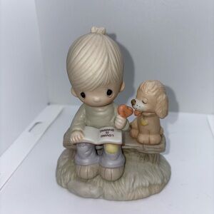 Vintage1979 Precious Moments figurine entitled "Loving is Sharing"model E-3110/B